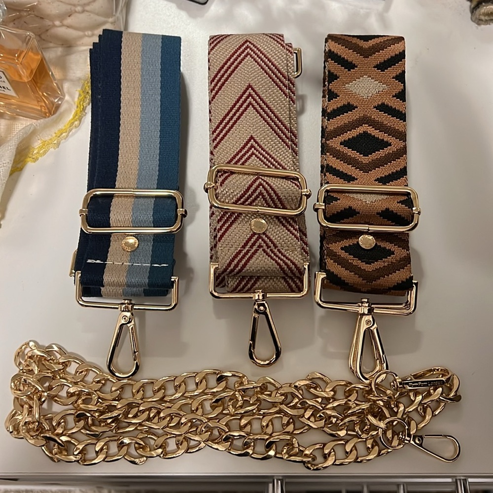 Four Pom Pom London crossbody bag straps